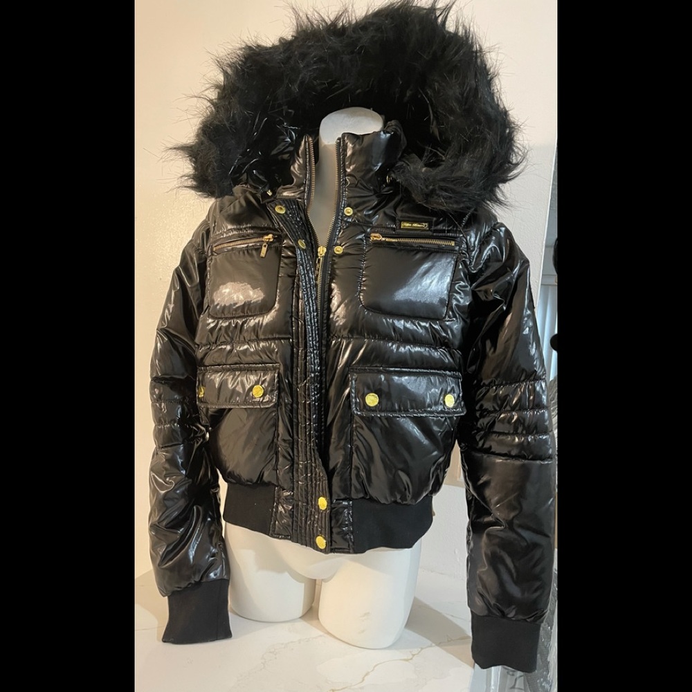 Black jacket, accented with gold hardware and detachable hood